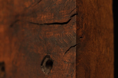 Close detail of a stabilized natural wood check on the relic grade timber block showing authentic dimensional character traits. 