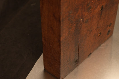 Lower side profile of the thick-cut monolithic wood slab highlighting the precision cut base and stabilized organic cell structure. 