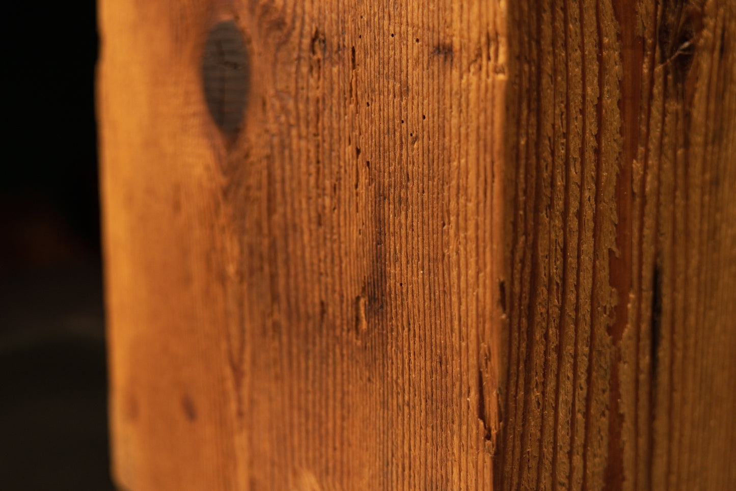 Detailed macro of the pristine flat face on a structural wooden block revealing deep cellular organic grain.   