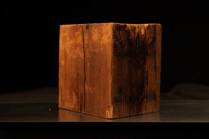 Straight frontal perspective of a climate-stable architectural salvage block displaying golden grain and a dark weathered side.[cite: 1, 3]
