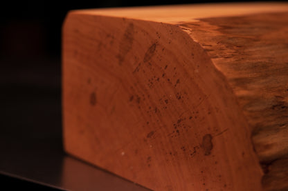 Macro focus on the flawless sharp lower corner of a floor-heating compatible wooden piece engineered for luxury B2B projects.   