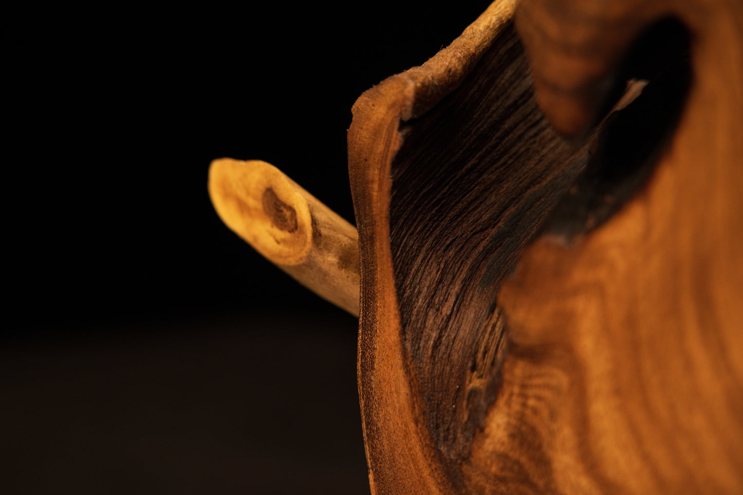 Close perspective of dense vertical grain paths concluding at a perfectly level precision-cut base for secure placement.   
