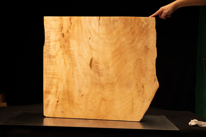 Frontal perspective of a floor-heating compatible architectural slab revealing sweeping golden grain and a flat precision cut. 