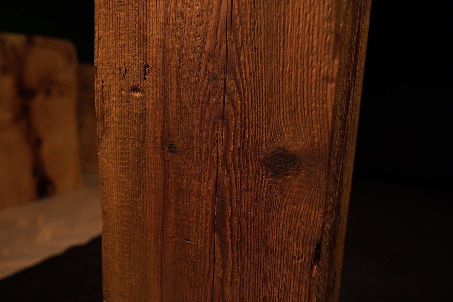 Detailed view of smooth sweeping vertical grain lines and subtle color transitions on a floor-heating compatible timber.  