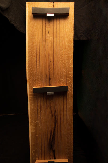 Straight vertical rear perspective of the architectural oak mirror showing its modular slatted design and hardware bars. 