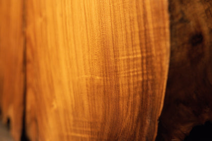 Macro focus prioritizing uniform vertical grain alignment and warm, consistent golden coloration across the timber face. 